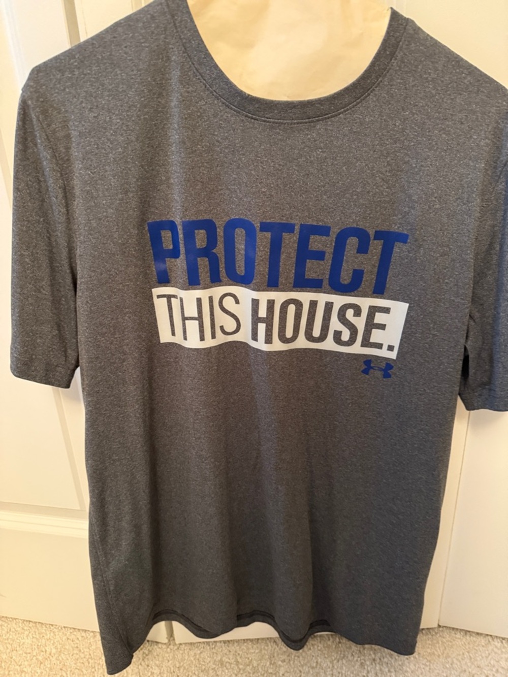 Under Armour Gray Tee with Blue and White "Protect This House" Graphic